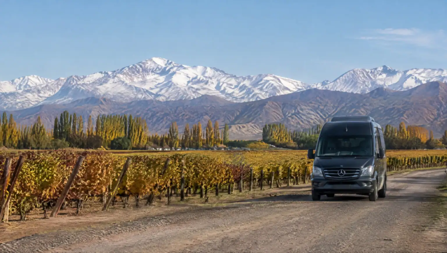 Private transfer car driving through the Andes mountains near Mendoza, Argentina