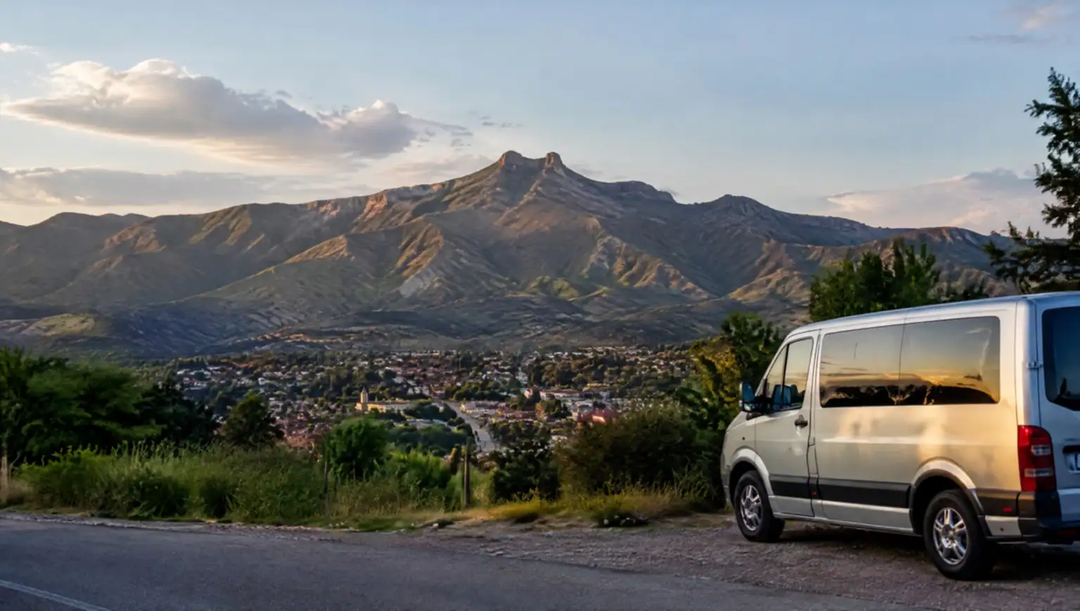 Private transfer vehicle driving through the Punilla Valley toward Capilla del Monte, Córdoba